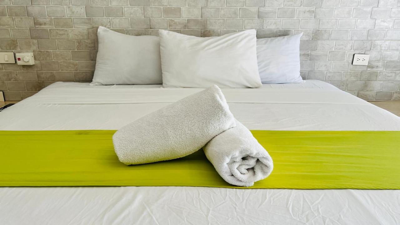 Hotel Mayari Holbox エクステリア 写真 Bath towels on a bed